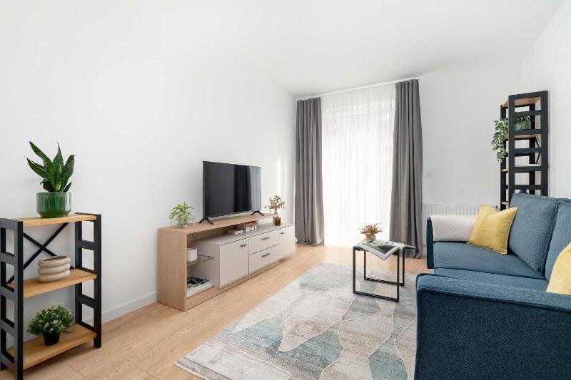 Spacious Apartment with Functional Interiors Parking & Balcony by Noclegi Renters - image 1