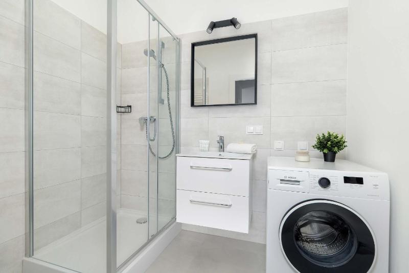Spacious Apartment with Functional Interiors Parking & Balcony by Noclegi Renters - image 11