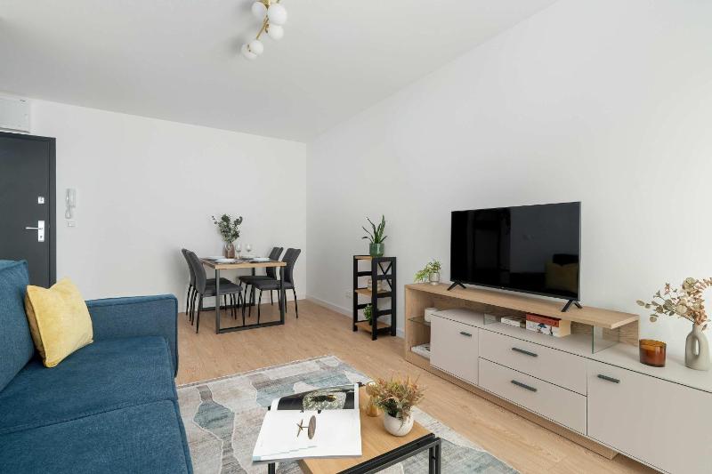 Spacious Apartment with Functional Interiors Parking & Balcony by Noclegi Renters - image 6