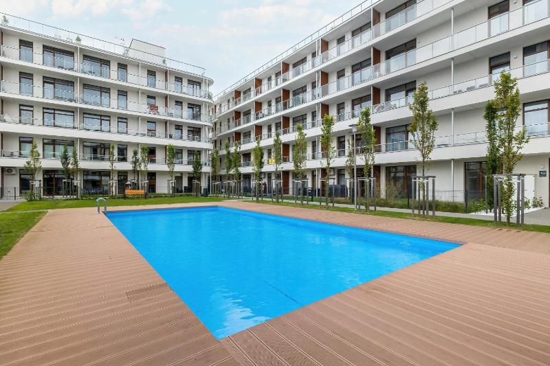 Ku Morzu Przytulny Apartament Blisko Plaży Parking & Balkon by Noclegi Renters - image 8