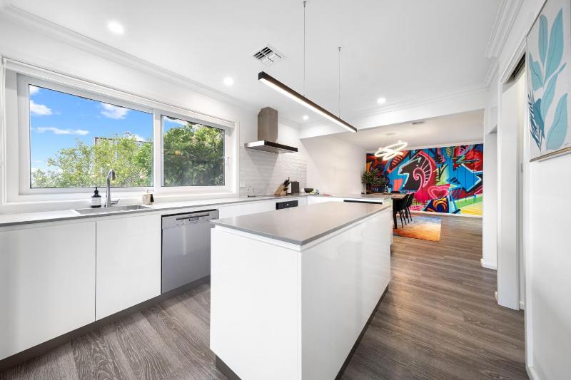 4-Bed Family Home with Spacious Backyard and BBQ - image 14