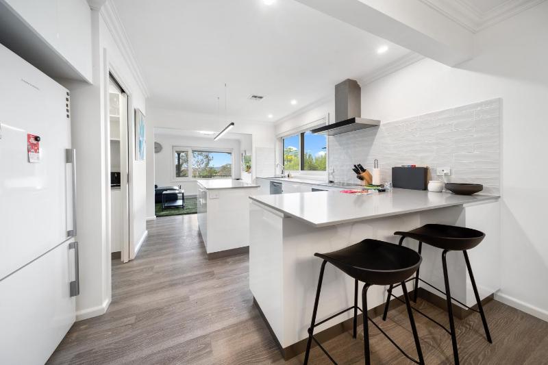 4-Bed Family Home with Spacious Backyard and BBQ - image 15