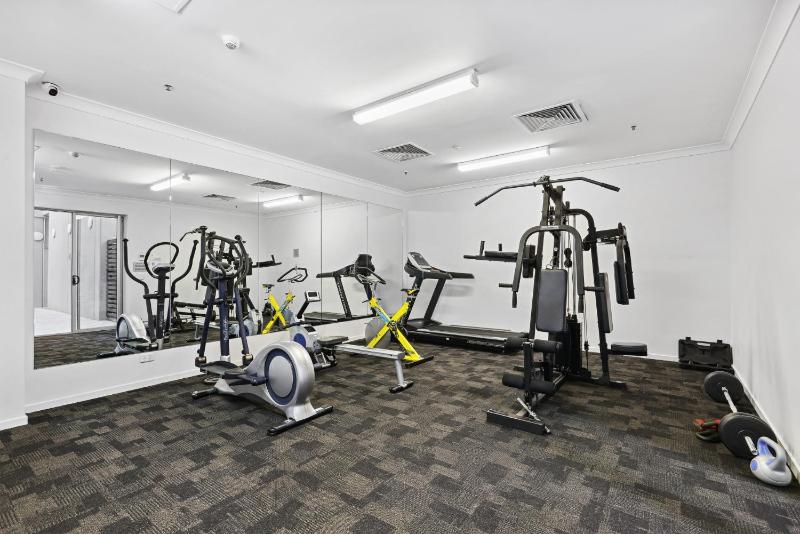 2-Bed City Abode with Swimming Pool Gym & Views - image 6