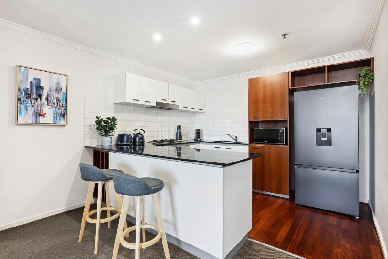 2-Bed City Abode with Swimming Pool Gym & Views - image 5