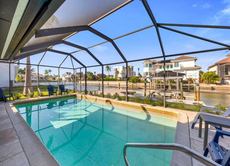 New Listing! Waterfront Escape on canal w/Pool - image 1