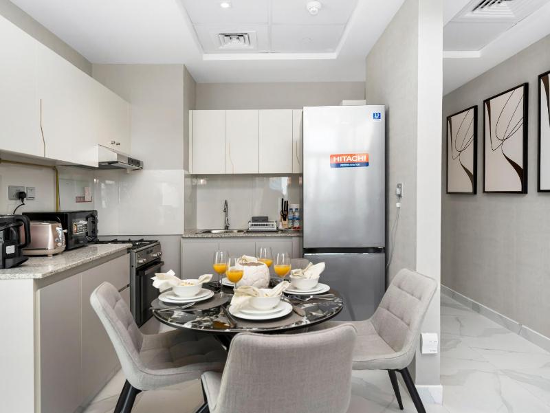 Stunning Burj Khalifa & Lake View 2BR with GYM and Pool - image 10