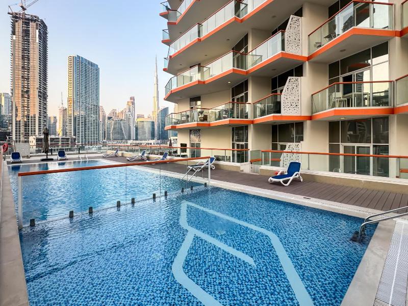 Stunning Burj Khalifa & Lake View 2BR with GYM and Pool - image 12