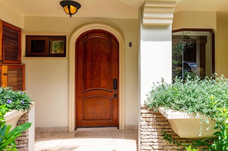 Stylish Split-Level Condo with a Shaded Terrace Direct Beach Access and Resort-Style Community Amenities - image 10