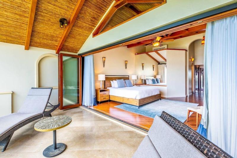 Stylish Split-Level Condo with a Shaded Terrace Direct Beach Access and Resort-Style Community Amenities - image 9