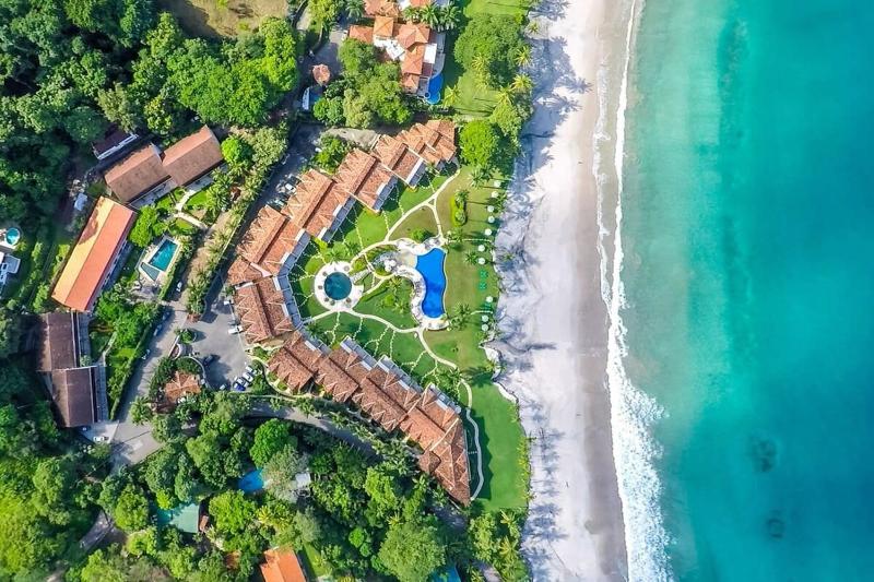Modern Oceanfront Condo with a Chic Coastal Design Resort-Style Amenities and Direct Beach Access - image 6