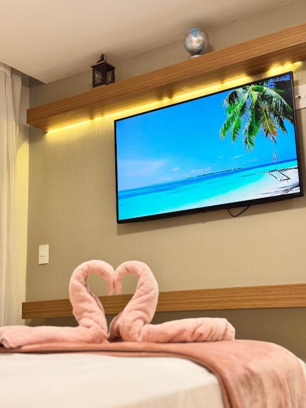 Magnífico APARTAMENTO de Charme - 3 quartos AR CONDICIONADOS SPLIT - Beira Mar 2 banheiros 2 Vagas Garagem 4 Varandas 2 Elevadores Redes para Descanso Wi-Fi Air Fryer Disney Plus HBO Max Cadeiras de Praia e Caixa Térmica - image 28