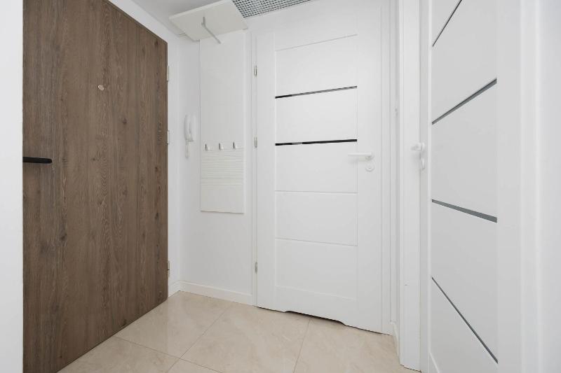 Ursynów Apartment with Desk & Balcony by Noclegi Renters - image 5
