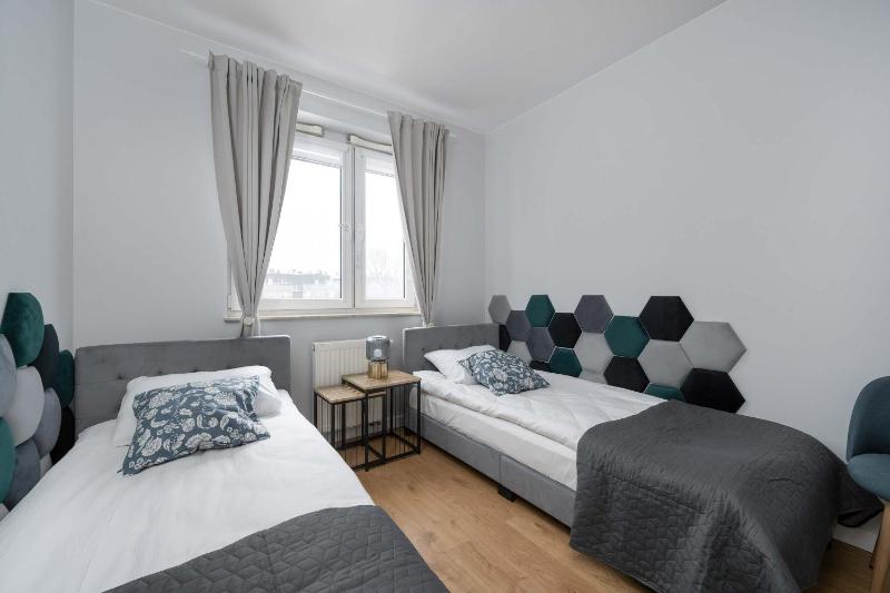 Bright Two Bedroom Apartment in Wrocław with Air Conditioning and Parking by Noclegi Renters - image 13