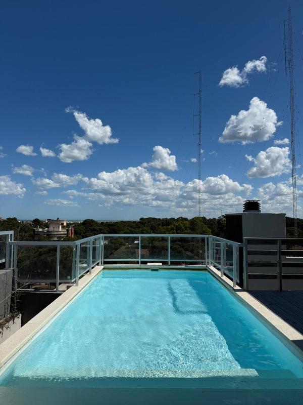 Dpto centrico con pileta y parrilla - image 14