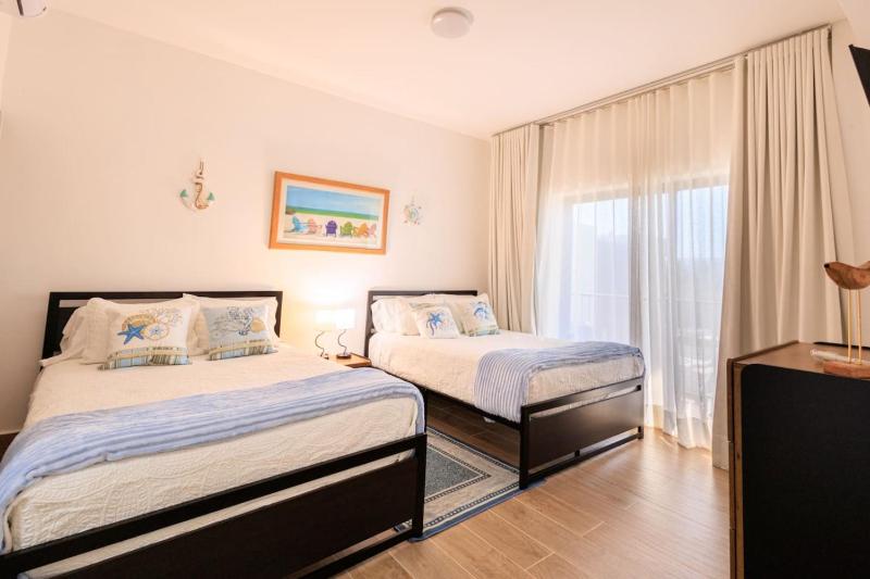 Cozy 2BD Condo Near Beach - image 13