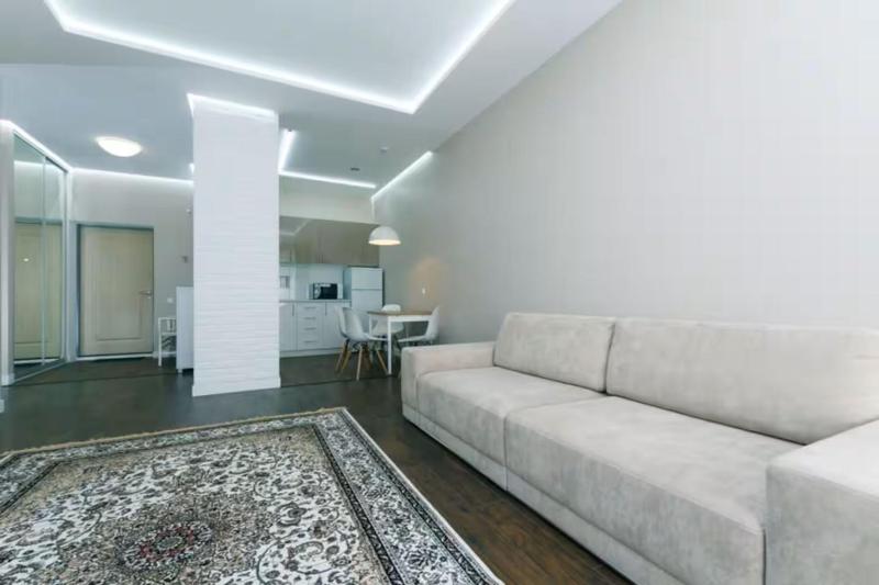 Apartment with a beautiful view in a new house in the center - image 13