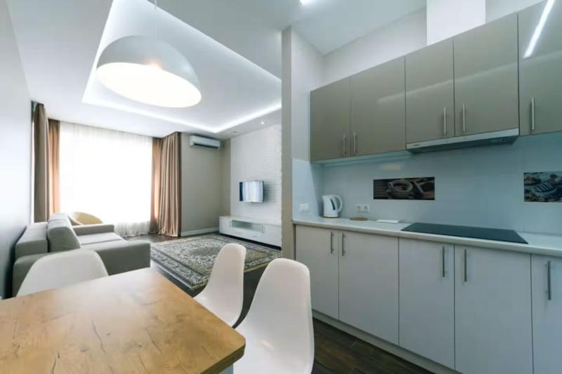 Apartment with a beautiful view in a new house in the center - image 7