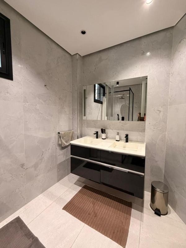 AtlasStay - 3-bedroom apartment near stadium - image 12