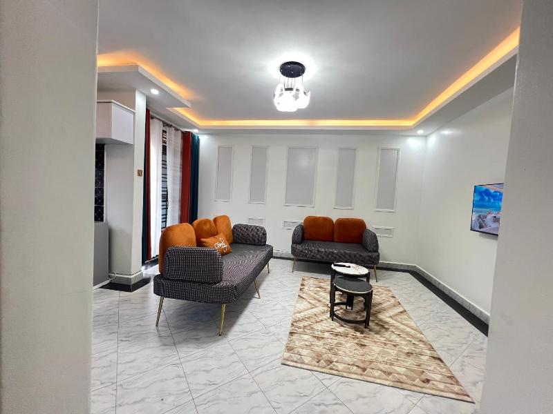 Modern 2- Bedroom Apartment for Long Stays - image 16