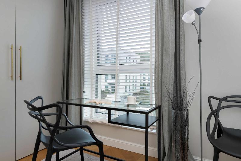 Elegant Apartment with Parking Space and Balcony by Noclegi Renters - image 6