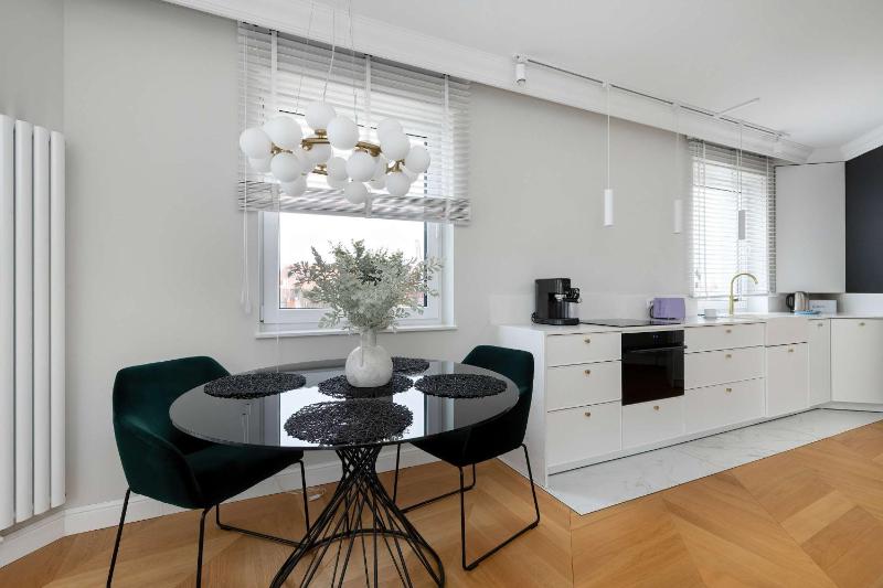 Elegant Apartment with Parking Space and Balcony by Noclegi Renters - image 15