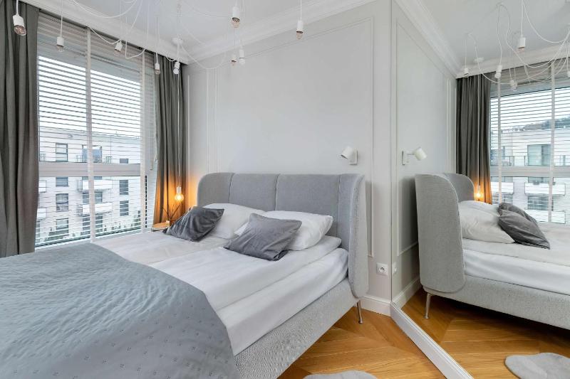 Elegant Apartment with Parking Space and Balcony by Noclegi Renters - image 21