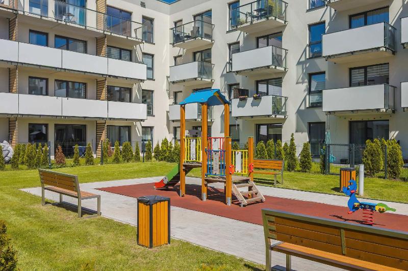 Elegant Apartment with Parking Space and Balcony by Noclegi Renters - image 19
