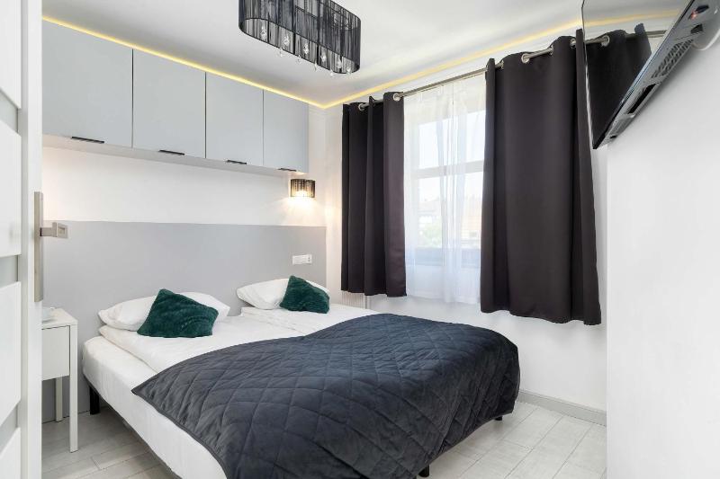 Cosy Apartments with Parking & Balcony by Noclegi Renters - image 1