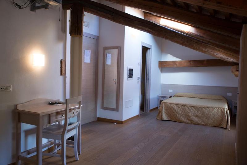 Quadruple Room with Private Bathroom image 1