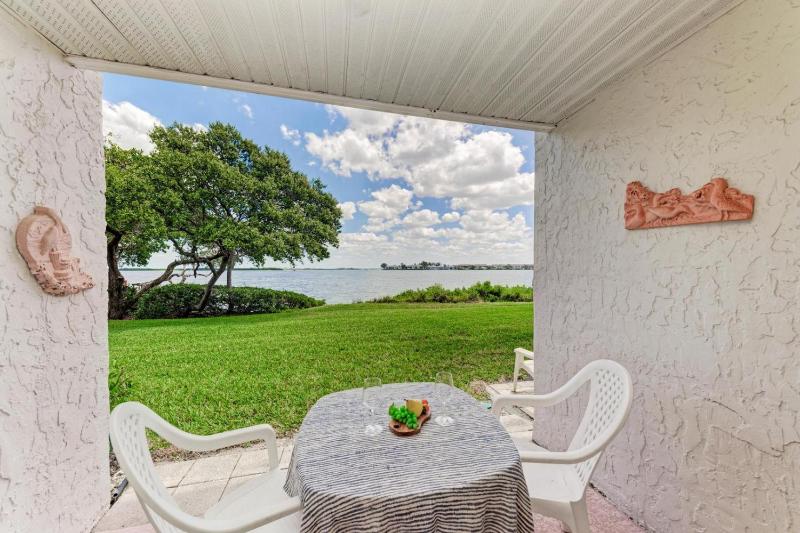 Blissfull Bay: Runaway Bay - Bayfront Condo! Largest Heated Pool by Anna Maria Life Vacation Rentals - image 1