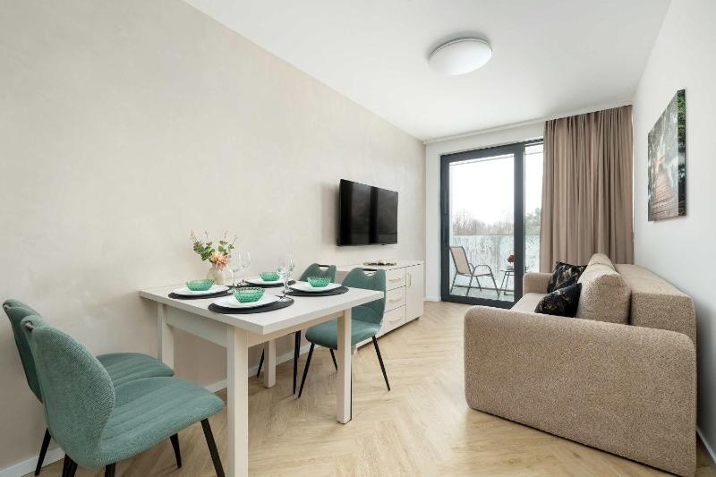 LUX Top Floor Apartments Art Lake Mielno with Pool Air Conditioning and Parking by Noclegi Renters - image 2