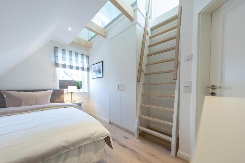 Modernes Ferienhaus mit Sauna eingezäuntem Garten und Strandnähe Ideal für Familien Freunde und Hundeliebhaber - image 15