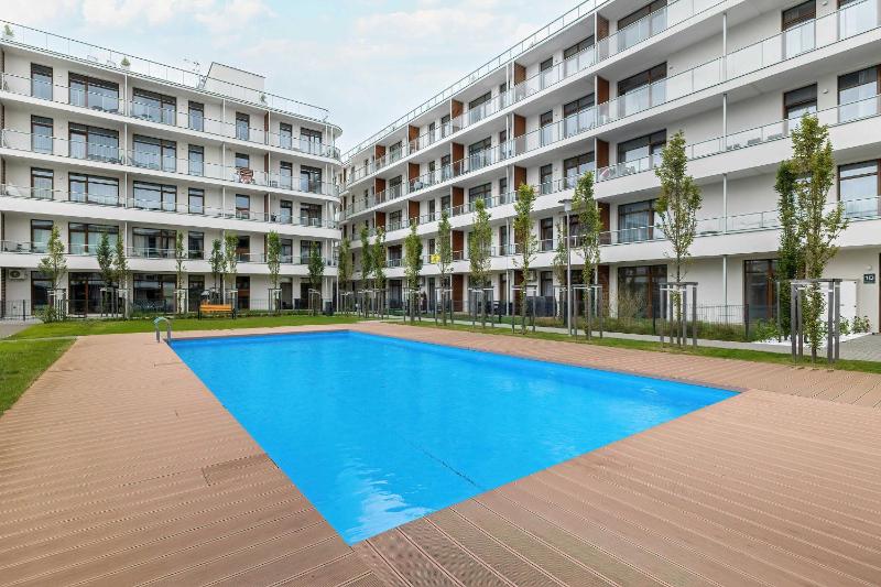 Blue and Beige Apartment in Sianożęty with Seasonal Pool Parking and Balcony by Noclegi Renters - image 18