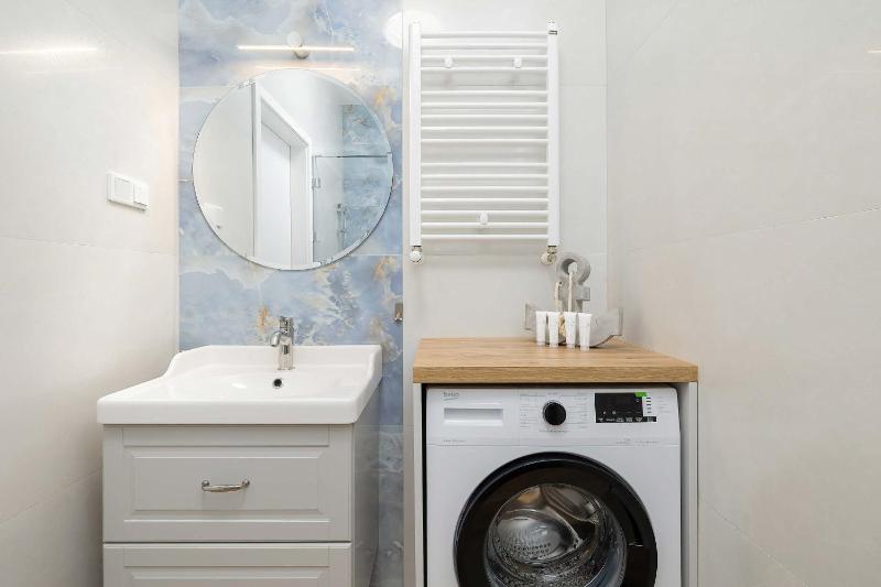 Blue and Beige Apartment in Sianożęty with Seasonal Pool Parking and Balcony by Noclegi Renters - image 2