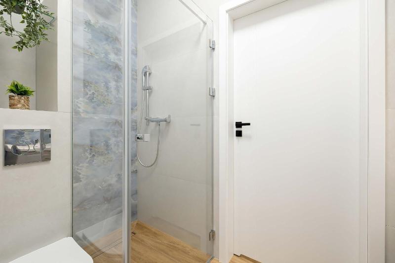 Blue and Beige Apartment in Sianożęty with Seasonal Pool Parking and Balcony by Noclegi Renters - image 5