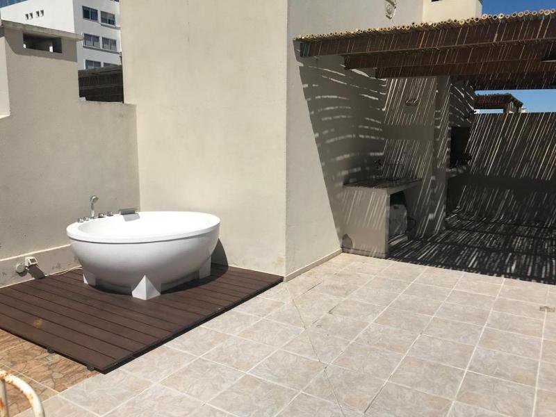 Apartamento con jacuzzi y parrillero exclusivos - image 11