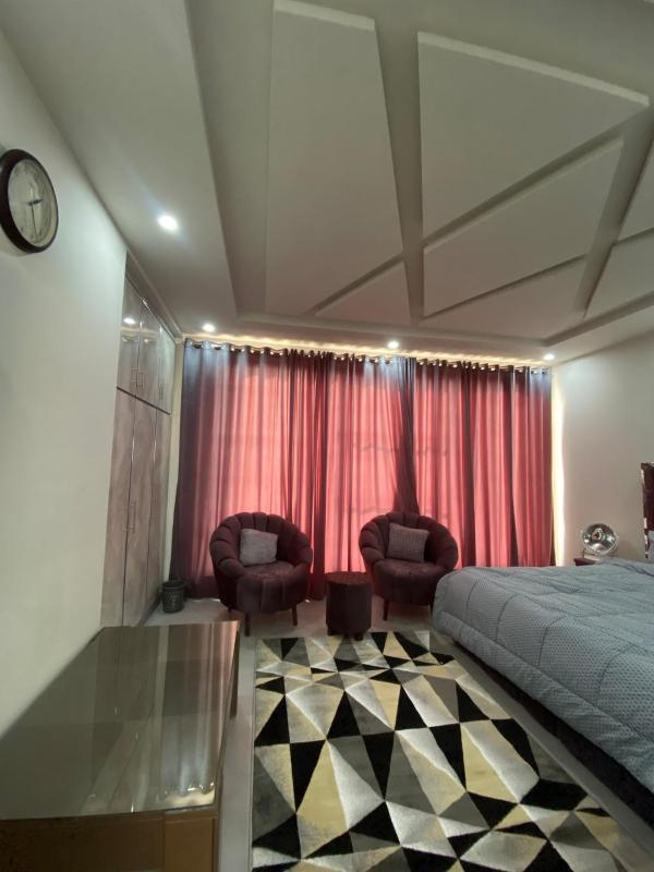 Modern 1BHK Apartment with Kitchen and Dining Area - image 8