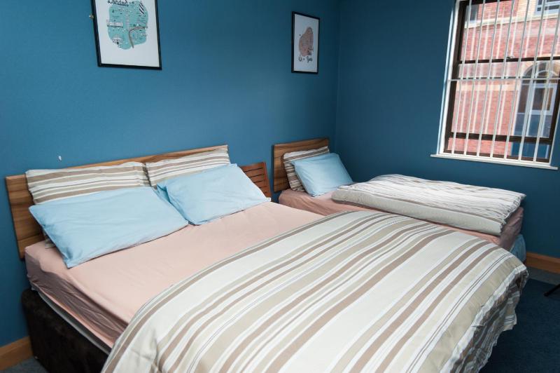 Superior Triple Room with Shared Bathroom image 1