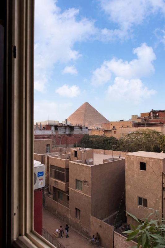 Hathor palace pyramids view - image 3