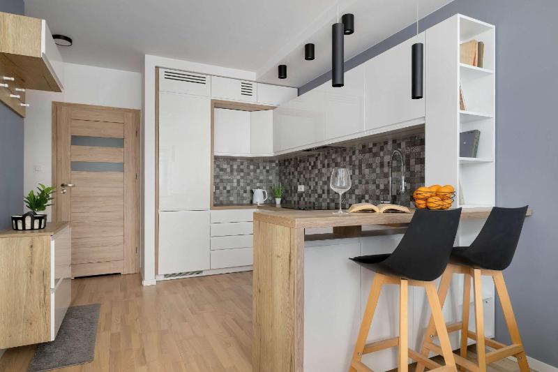 Modern Grey Apartment Close to the Centre of Rzeszów Perfect for Remote Work by Noclegi Renters - image 9