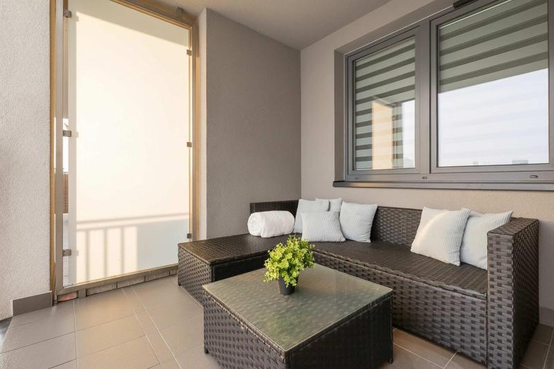 Modern Grey Apartment Close to the Centre of Rzeszów Perfect for Remote Work by Noclegi Renters - image 20