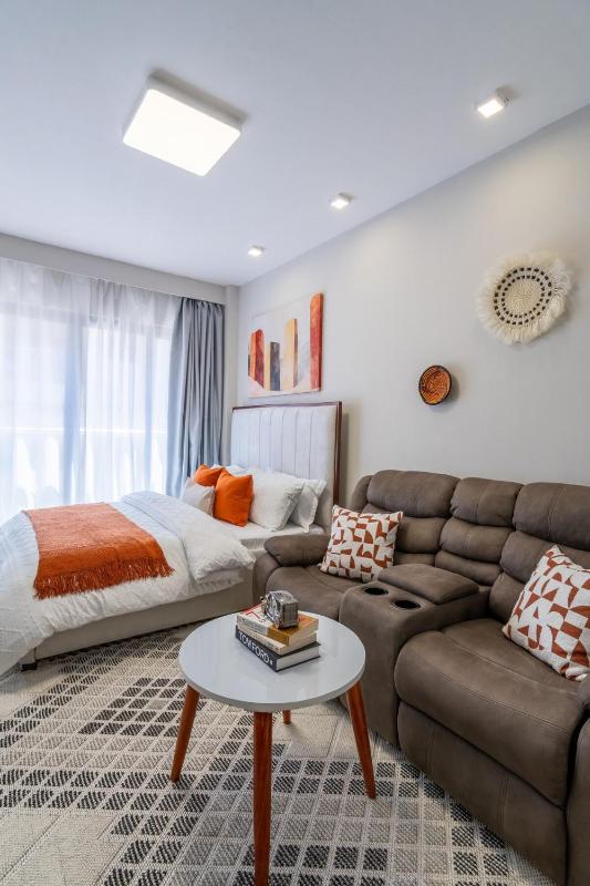 PJ Suites Studio Near SGR JKIA Expressway with Gym Pool Wi-Fi - image 4