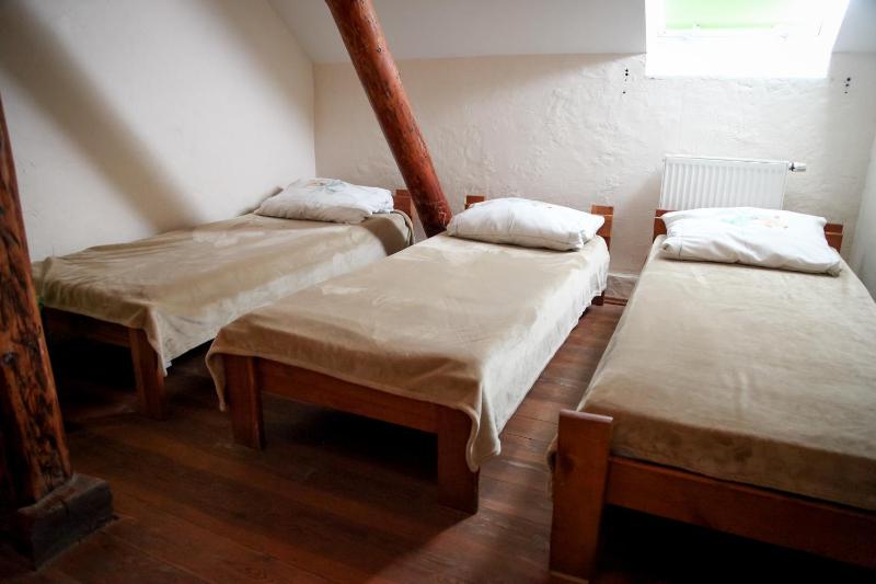 Basic Triple Room with Shared Bathroom image 1