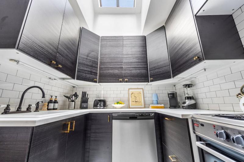 The West Village Penthouse Huge Windows Desk Skylights Cobblestone Street - image 16