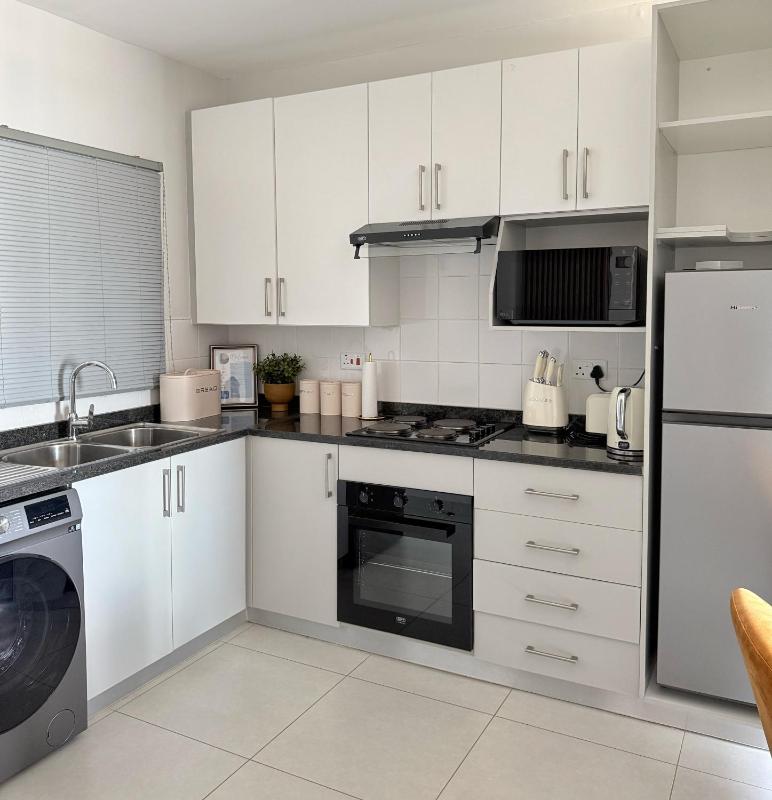Urban Bleu - Modern 1 Bed Executive Apartment in Sarona Gaborone with WiFi Free Parking and Pool - image 15