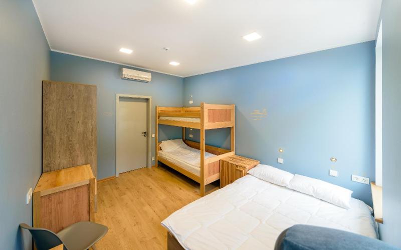 Family Room with Shared Bathroom image 2
