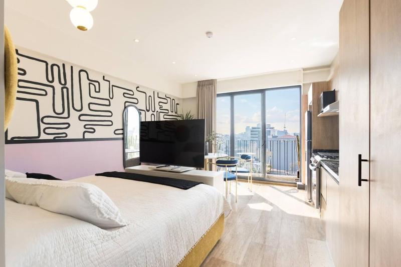 Loft de diseno con aire acondicionado y cama king size - image 25