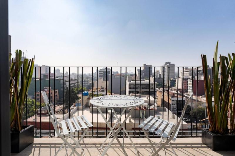 Loft de diseno con aire acondicionado y cama king size - image 7