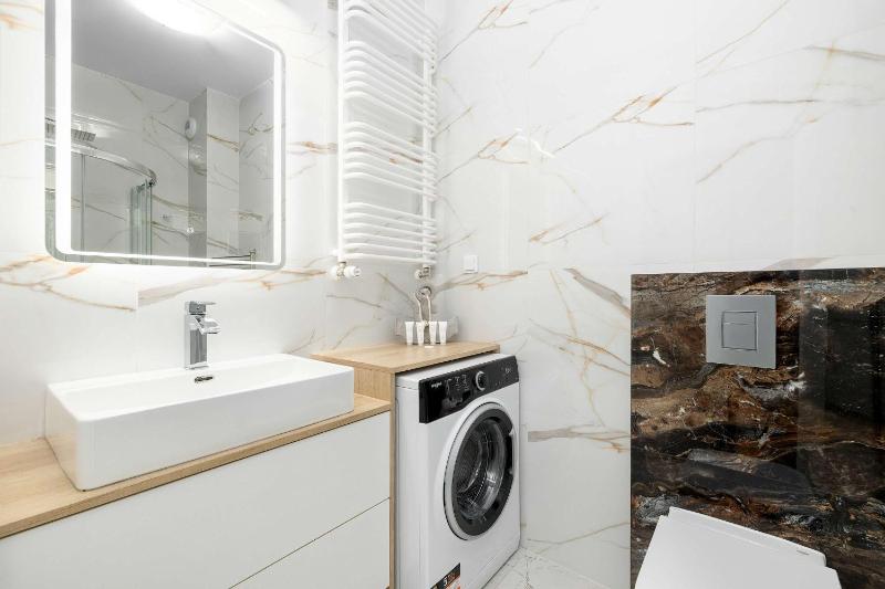 Ku Morzu Nadmorski Apartament w Pobliżu Plaży z Basenem i Parkingiem by Noclegi Renters - image 20
