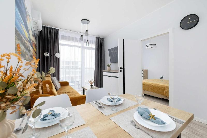 Ku Morzu Nadmorski Apartament w Pobliżu Plaży z Basenem i Parkingiem by Noclegi Renters - image 24